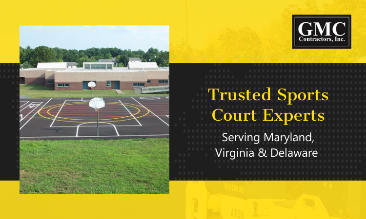 GMC Contractors team resurfacing sports court